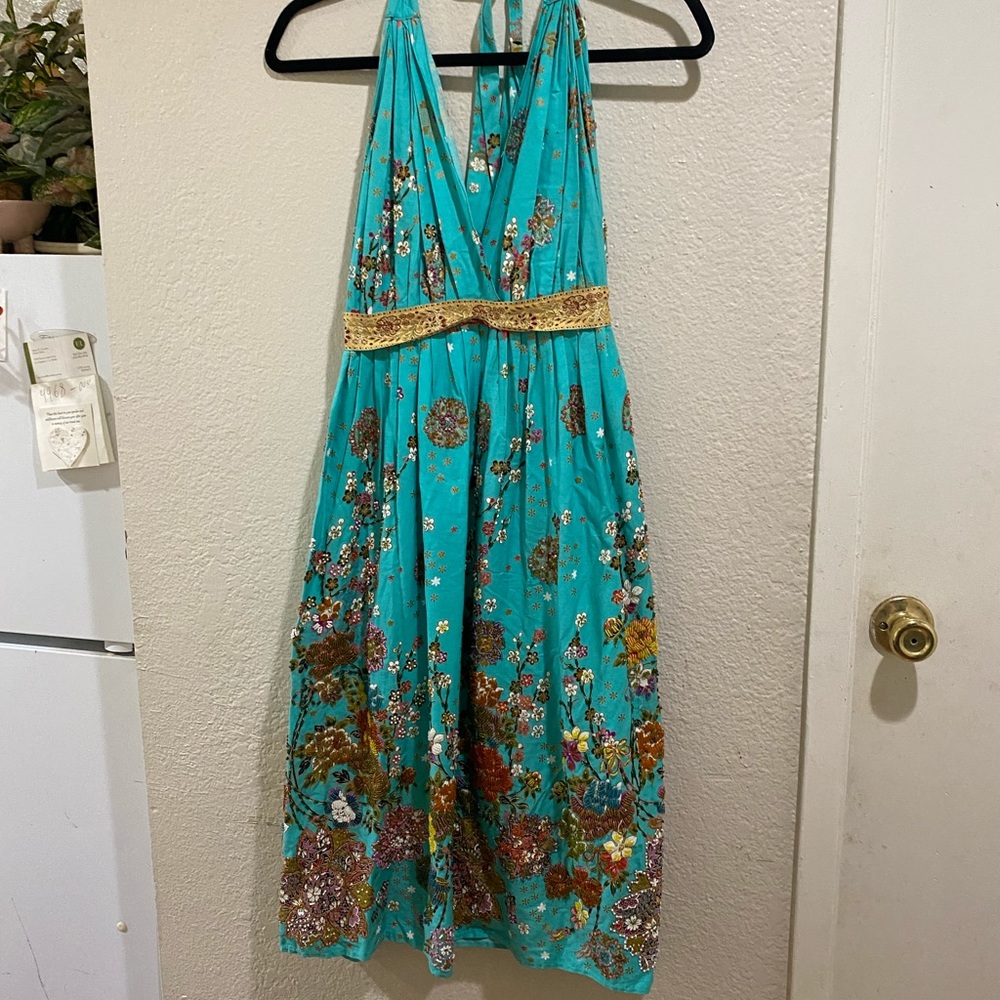 Leader Turquoise Floral Dress with beading throughout and gold trim under bust